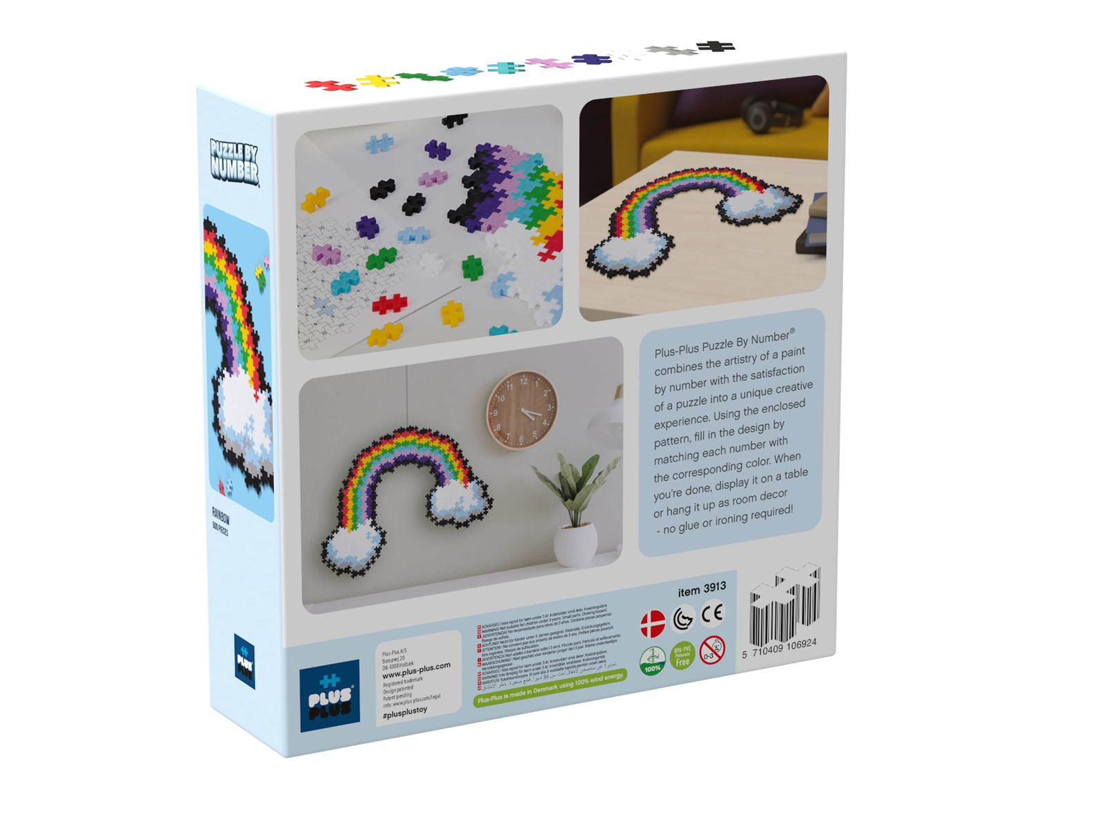 Dłoń dziecka układająca kolorową tęczę z klocków Plus-Plus według schematu by number