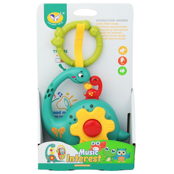 ZABAWKA DINOZAUR MUZYCZNY INTERAKTYWNY DLA NIEMOWLĄT ZAWIESZKA DŹWIĘK