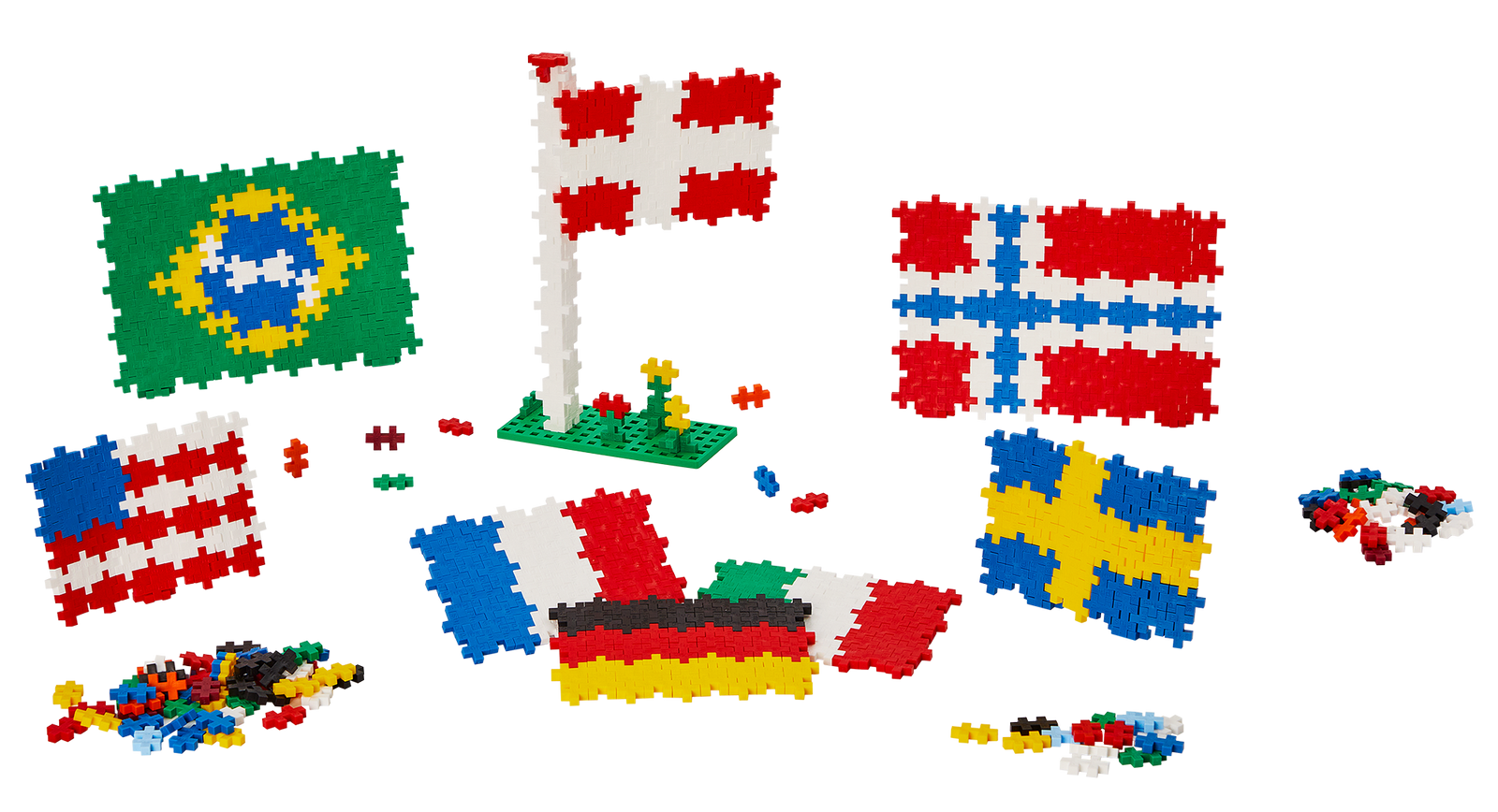 Pojemnik edukacyjny Plus-Plus z opisem zawartości oraz rozłożonymi elementami