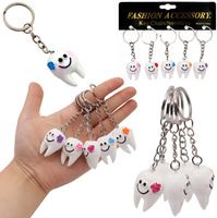 BRELOK ZĄB ZAWIESZKA BRELOCZEK DO KLUCZY ZAWIESZKA NA TOREBKĘ GADŻET 12 SZT